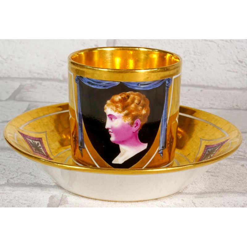 Paris porcelain, cup and saucer representing the King of Rome, Empire period