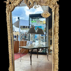 Grand miroir en bois sculpté et doré - France - XIXe siècle