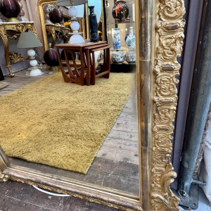 Grand miroir en bois sculpté et doré - France - XIXe siècle
