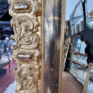 Grand miroir en bois sculpté et doré - France - XIXe siècle
