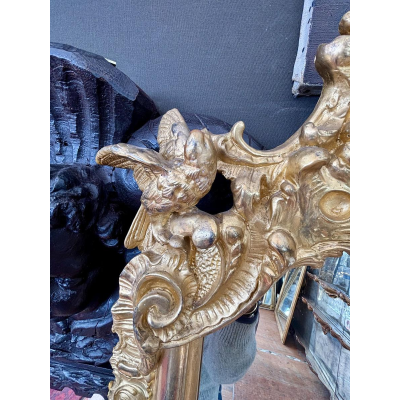 Grand miroir en bois sculpté et doré - France - XIXe siècle