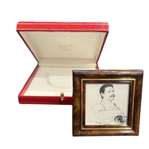 Must de Cartier cadre photo en métal doré et émail