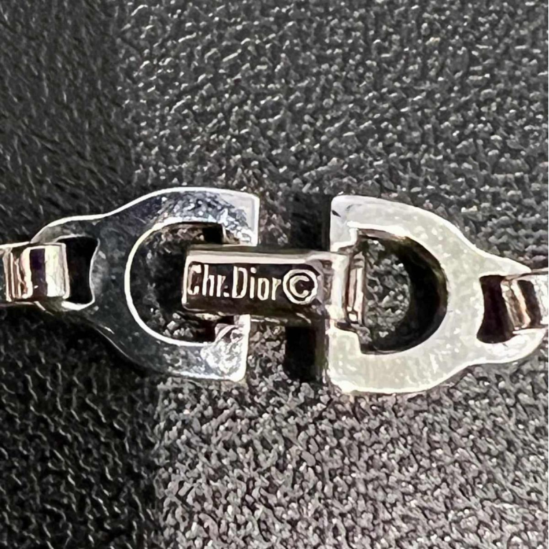 Christian DIOR, collier ras de cou, métal argenté et doré