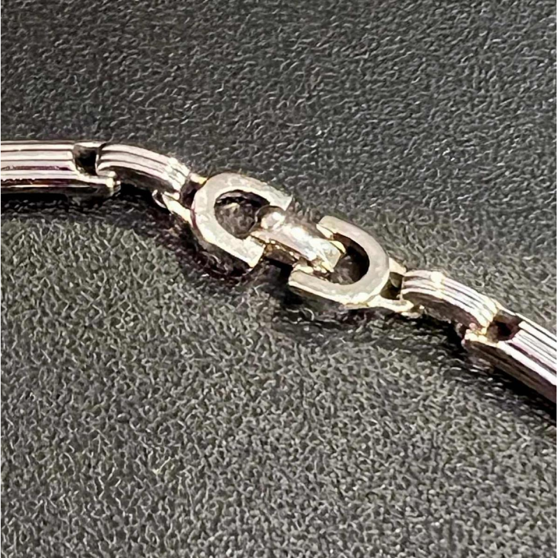 Christian DIOR, collier ras de cou, métal argenté et doré