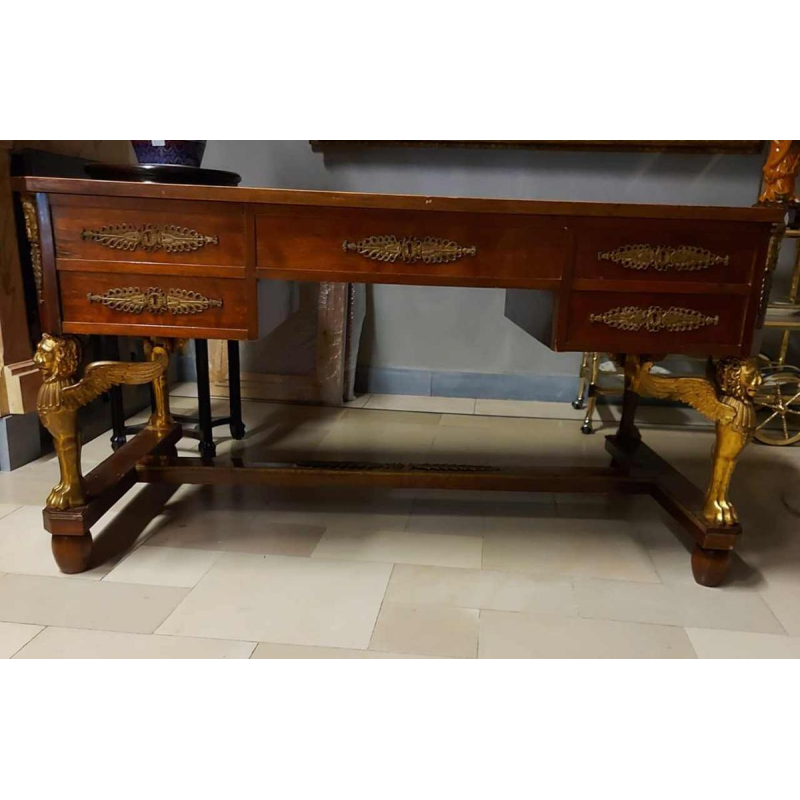 Bureau en acajou soutenu par quatre sphinx ailés en bronze + fauteuil, style Empire XIXe s
