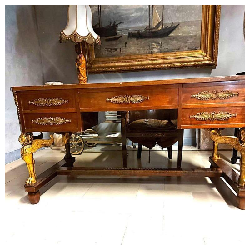 Bureau en acajou soutenu par quatre sphinx ailés en bronze + fauteuil, style Empire XIXe s