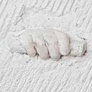 Bas-relief in mixed materials "TOM BABY'S HANDS" (1988):