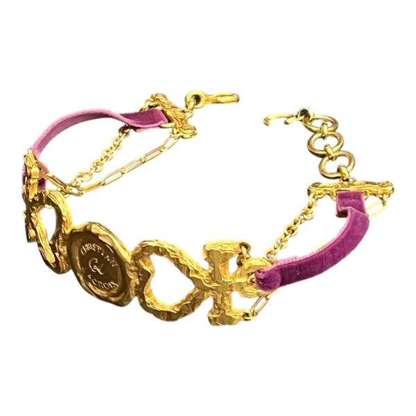 Christian LACROIX, choker-ketting in goudkleurig metaal en paars fluweel.