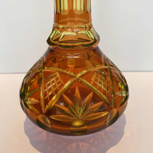 Val Saint Lambert, long-necked vase in cut urane crystal with orange lining