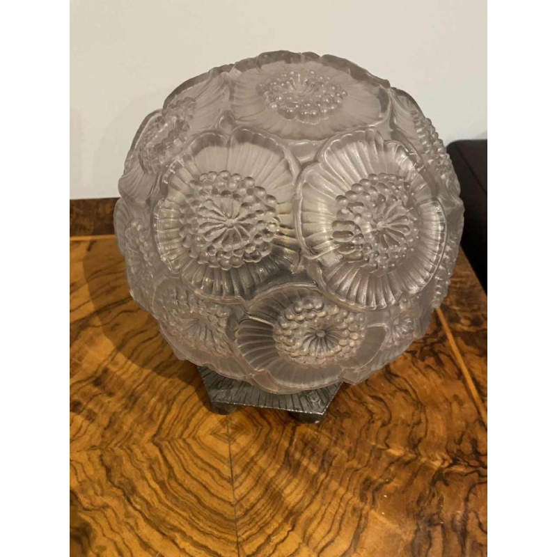 Art Deco table lamp, pressed ball glass with floral decoration, hexagonal wrought iron base, ca 1930