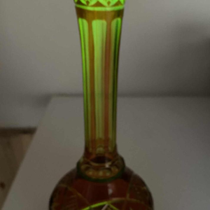 Val Saint Lambert, long-necked vase in cut urane crystal with orange lining