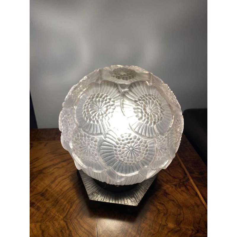 Art Deco table lamp, pressed ball glass with floral decoration, hexagonal wrought iron base, ca 1930