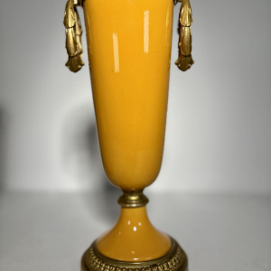 Pair of porcelain vases on pedestals, adorned with a gilt bronze mount, 19th century