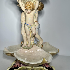 Large majolica centerpiece, putti and shells, Italy, late 19th - early 20th century