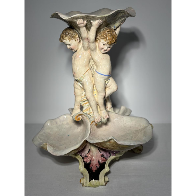 Large majolica centerpiece, putti and shells, Italy, late 19th - early 20th century
