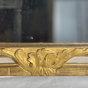 Louis XVI style mirror in carved and gilded wood, with hand-painted details, 18th century