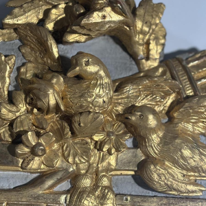 Louis XVI style mirror in carved and gilded wood, with hand-painted details, 18th century