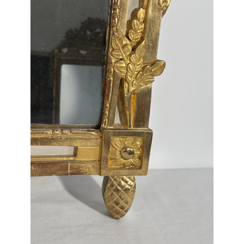 Louis XVI style mirror in carved and gilded wood, with hand-painted details, 18th century