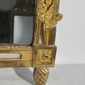 Louis XVI style mirror in carved and gilded wood, with hand-painted details, 18th century