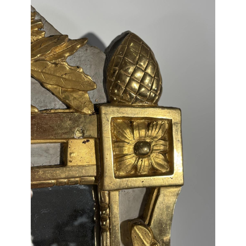 Louis XVI style mirror in carved and gilded wood, with hand-painted details, 18th century