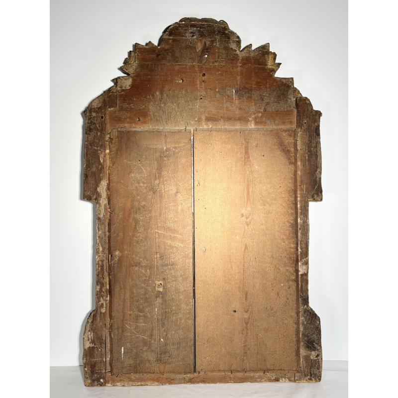 Miroir à fronton en bois doré sculpté, France, début XIXe siècle