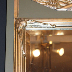 Art Deco mirror with silver leaf stucco ornaments, circa 1930