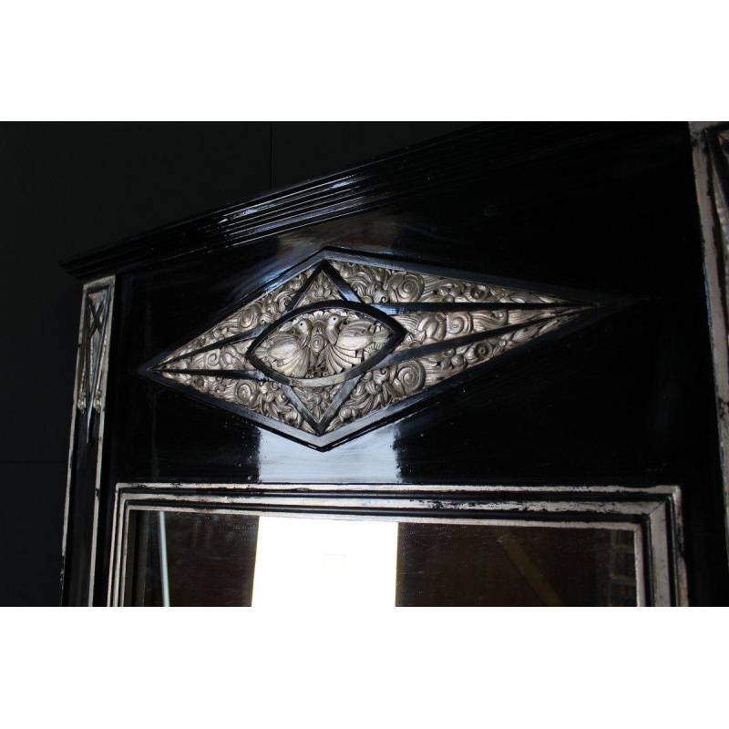 Large Art Deco mirror, wood and silver-patinated stucco, early 20th century