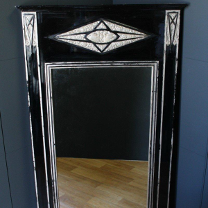Large Art Deco mirror, wood and silver-patinated stucco, early 20th century