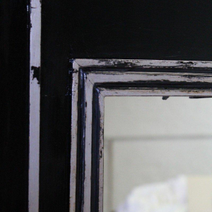 Large Art Deco mirror, wood and silver-patinated stucco, early 20th century