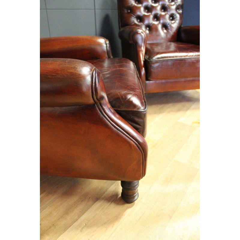 Pair of restored leather armchairs from the Château de Beauchêne in Saint-Saturnin-du-Limet, France, circa 1880