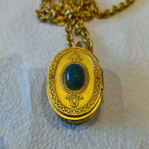 Karl Lagerfeld, necklace & pendant, gold-plated medallion with green cabochon, red enamel interior