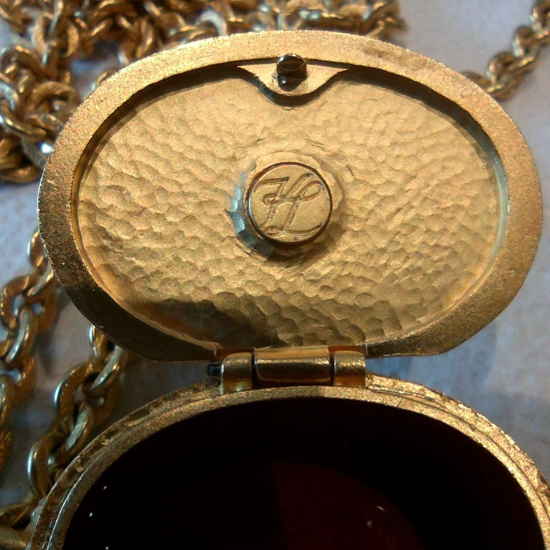 Karl Lagerfeld, necklace & pendant, gold-plated medallion with green cabochon, red enamel interior