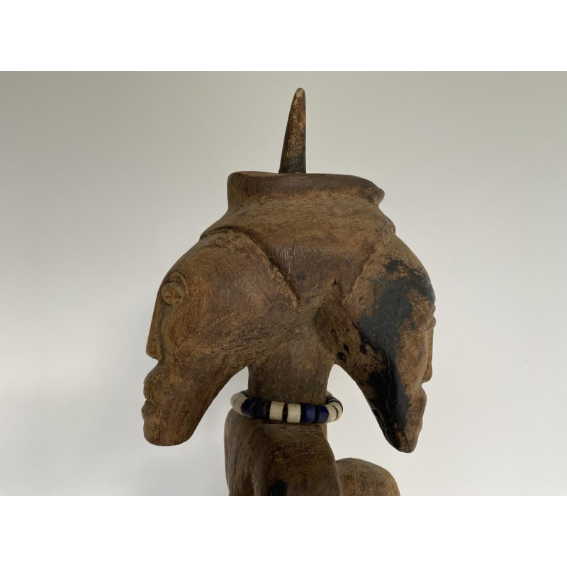 Two-headed protective statue, African