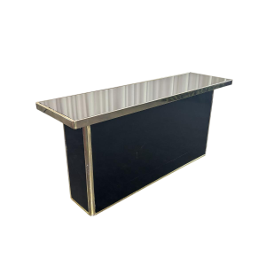 Hollywood Regency console in plexiglass, brass and black mirror