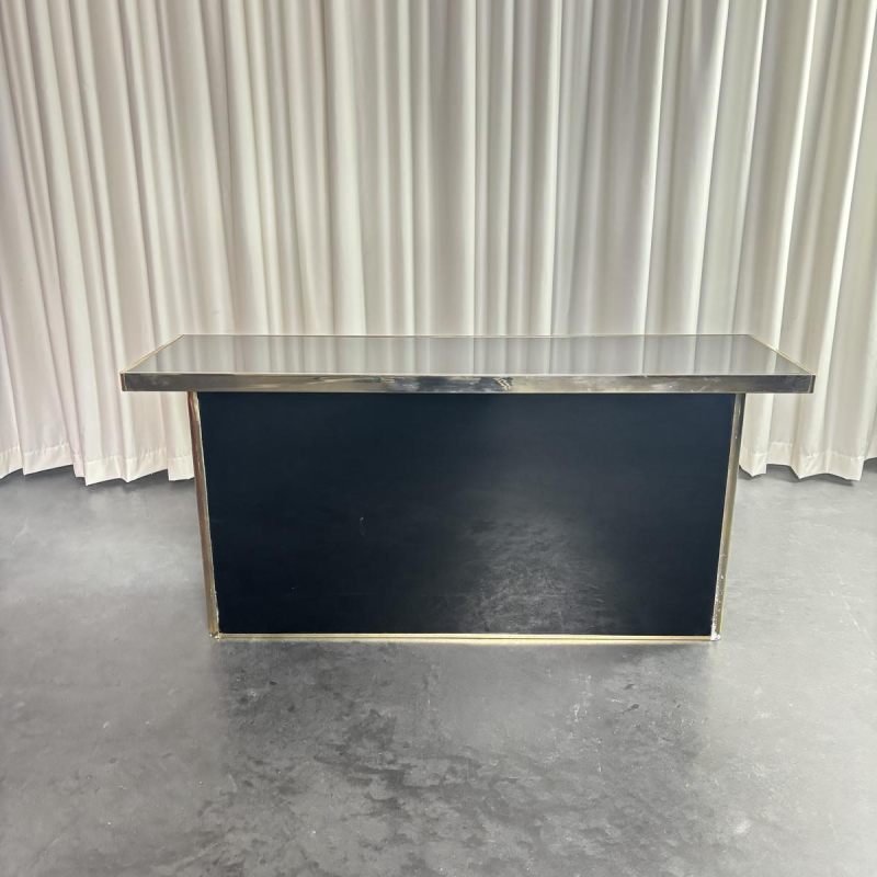 Hollywood Regency console in plexiglass, brass and black mirror