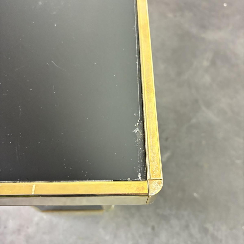 Hollywood Regency console in plexiglass, brass and black mirror