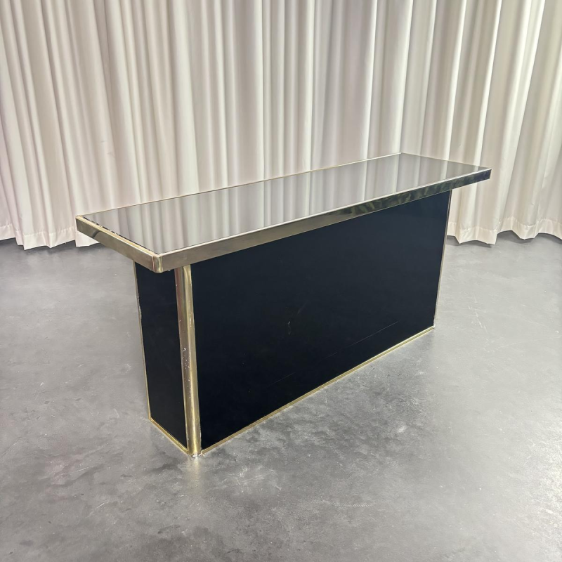 Hollywood Regency console in plexiglass, brass and black mirror
