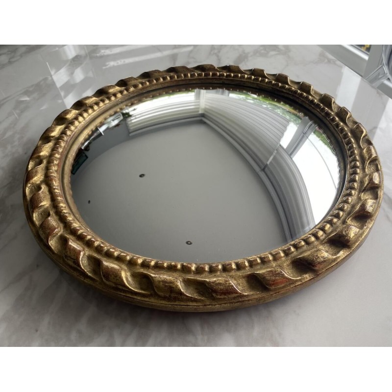 Miroir "oeil de sorcière" circulaire en bois sculpté doré