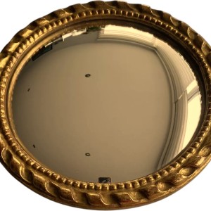 Miroir "oeil de sorcière" circulaire en bois sculpté doré