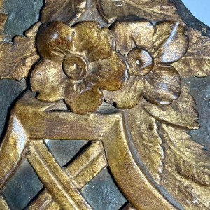 Mirror with a wooden and gilded stucco pediment - Louis XVI period - 18th century