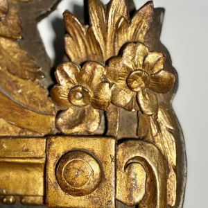 Mirror with a wooden and gilded stucco pediment - Louis XVI period - 18th century