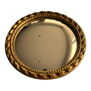 Miroir "oeil de sorcière" circulaire en bois sculpté doré