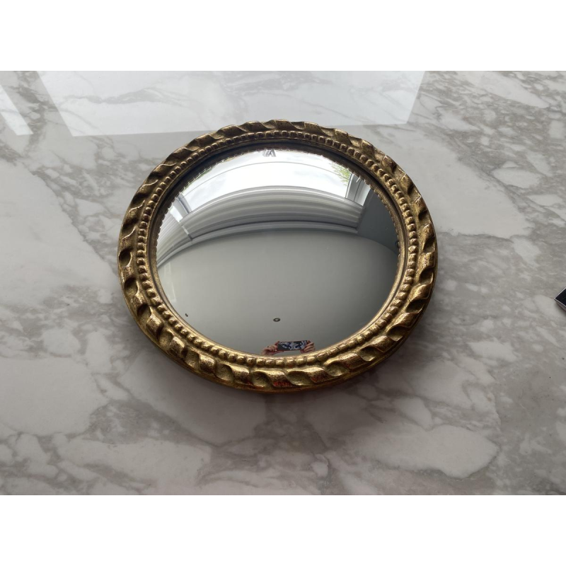 Miroir "oeil de sorcière" circulaire en bois sculpté doré