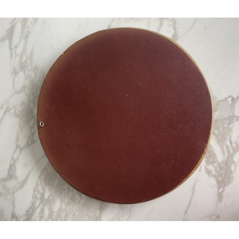 Circular "witch's eye" mirror in gilded carved wood