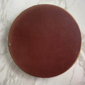 Circular "witch's eye" mirror in gilded carved wood