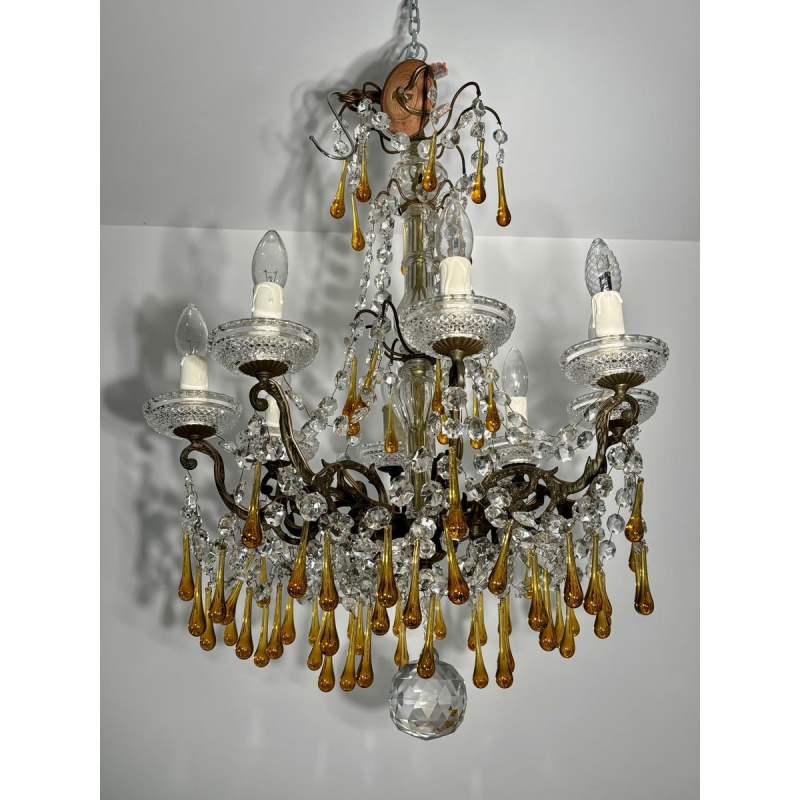 Eight-light chandelier with pendants, in bronze and crystal, amber glass drops, circa 1900