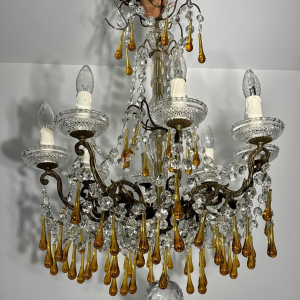 Eight-light chandelier with pendants, in bronze and crystal, amber glass drops, circa 1900