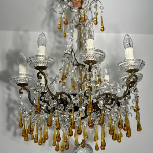 Eight-light chandelier with pendants, in bronze and crystal, amber glass drops, circa 1900