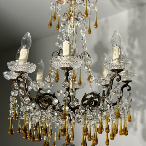 Eight-light chandelier with pendants, in bronze and crystal, amber glass drops, circa 1900