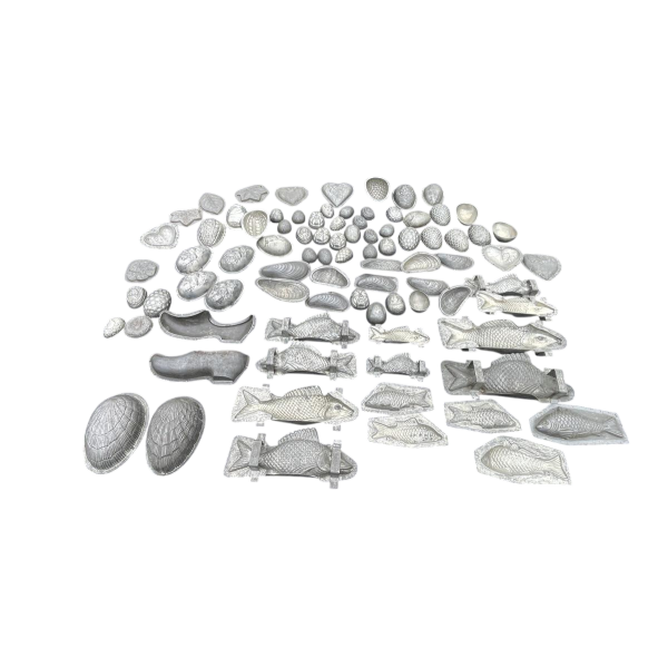 Important set of antique metal chocolate molds, early 20th century